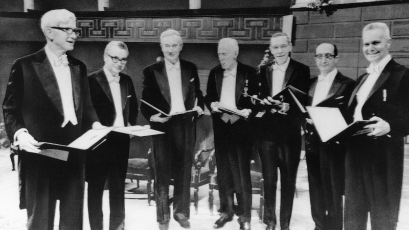 Gell-Mann (second from left) receiving his Nobel Prize in 1969.